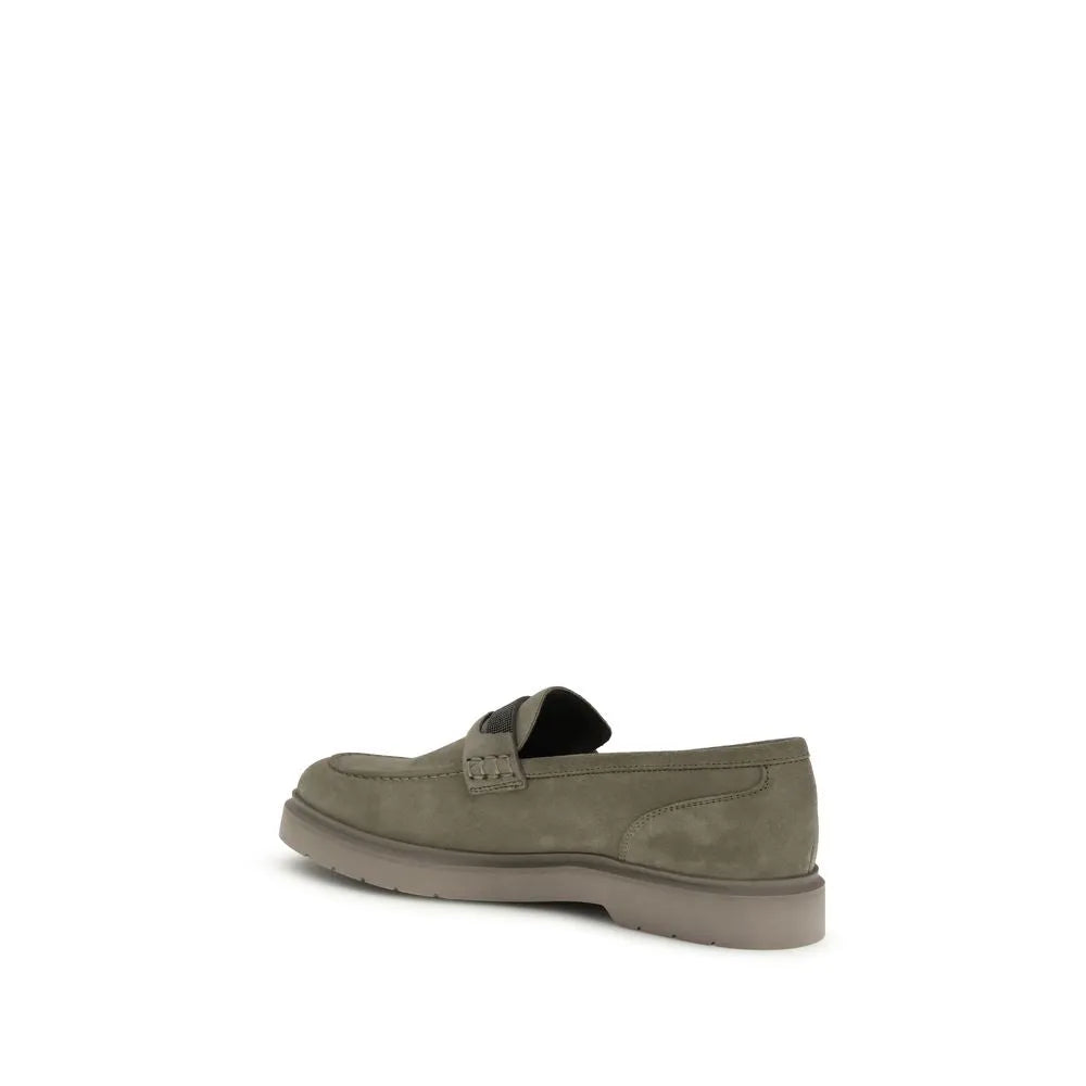Taupe suede slip-on loafer with thick matching rubber sole, almond toe, and penny strap detail.