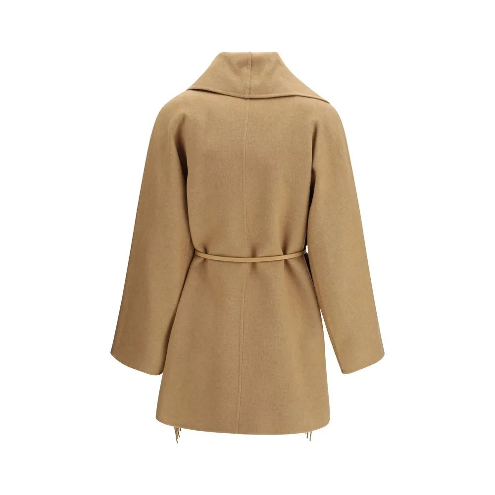 Beige camel hair wrap coat with a matching belt, wide kimono sleeves, and a fringed hem.
