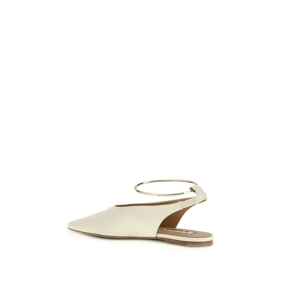 Beige goatskin square-toe ballet flat with a gold metal ankle ring and slingback strap.