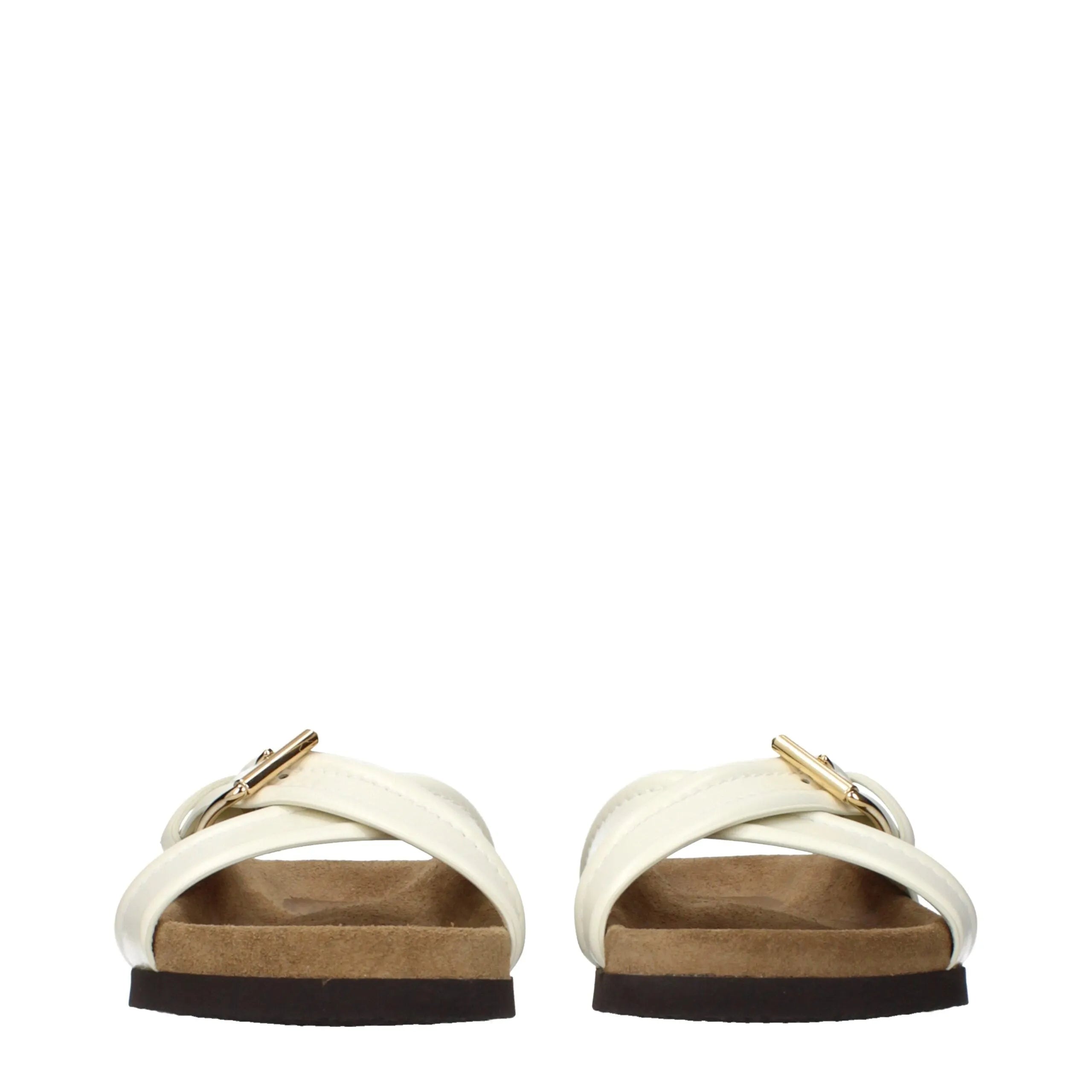 Beige leather cross-strap slide slippers featuring gold buckles and natural cork footbeds.