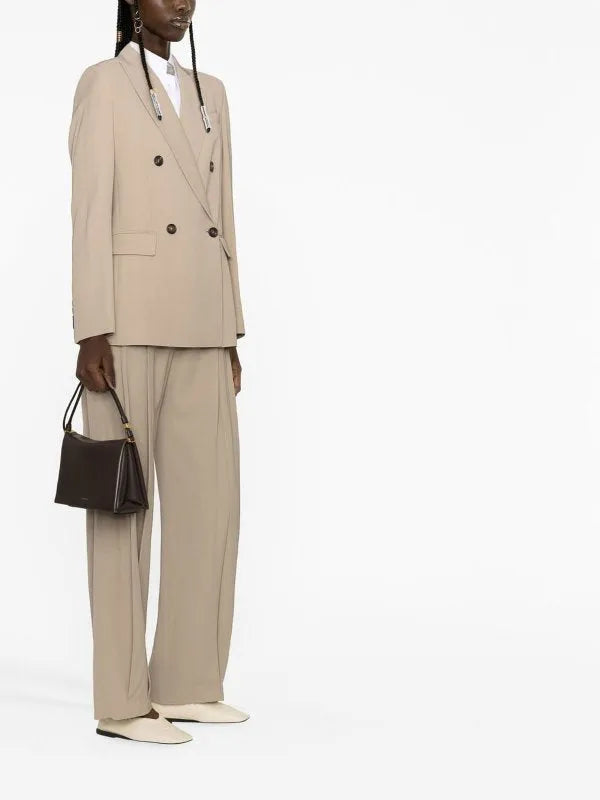 Chic Brunello Cucinelli women's Bleeker Beige double-breasted viscose blazer, styled with matching wide-leg trousers.