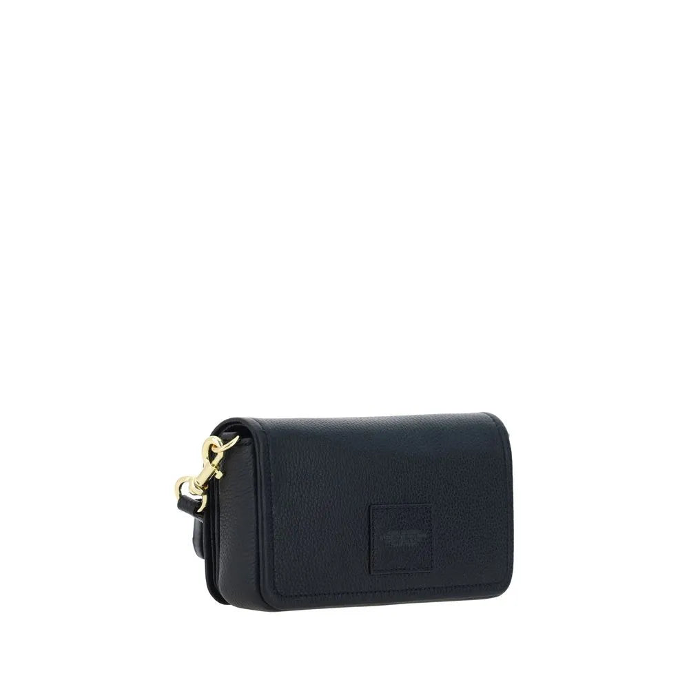 Black grained calf leather mini shoulder bag with a flap closure, gold-tone clasp, and front monogram.