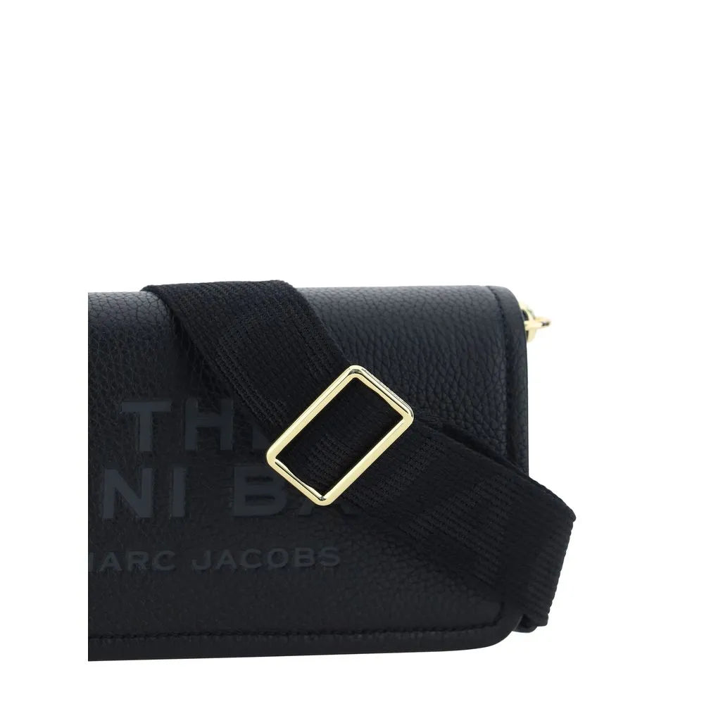 Black grained calf leather Marc Jacobs Mini Bag shoulder bag with press-stamped logo and black fabric strap with gold buckle.