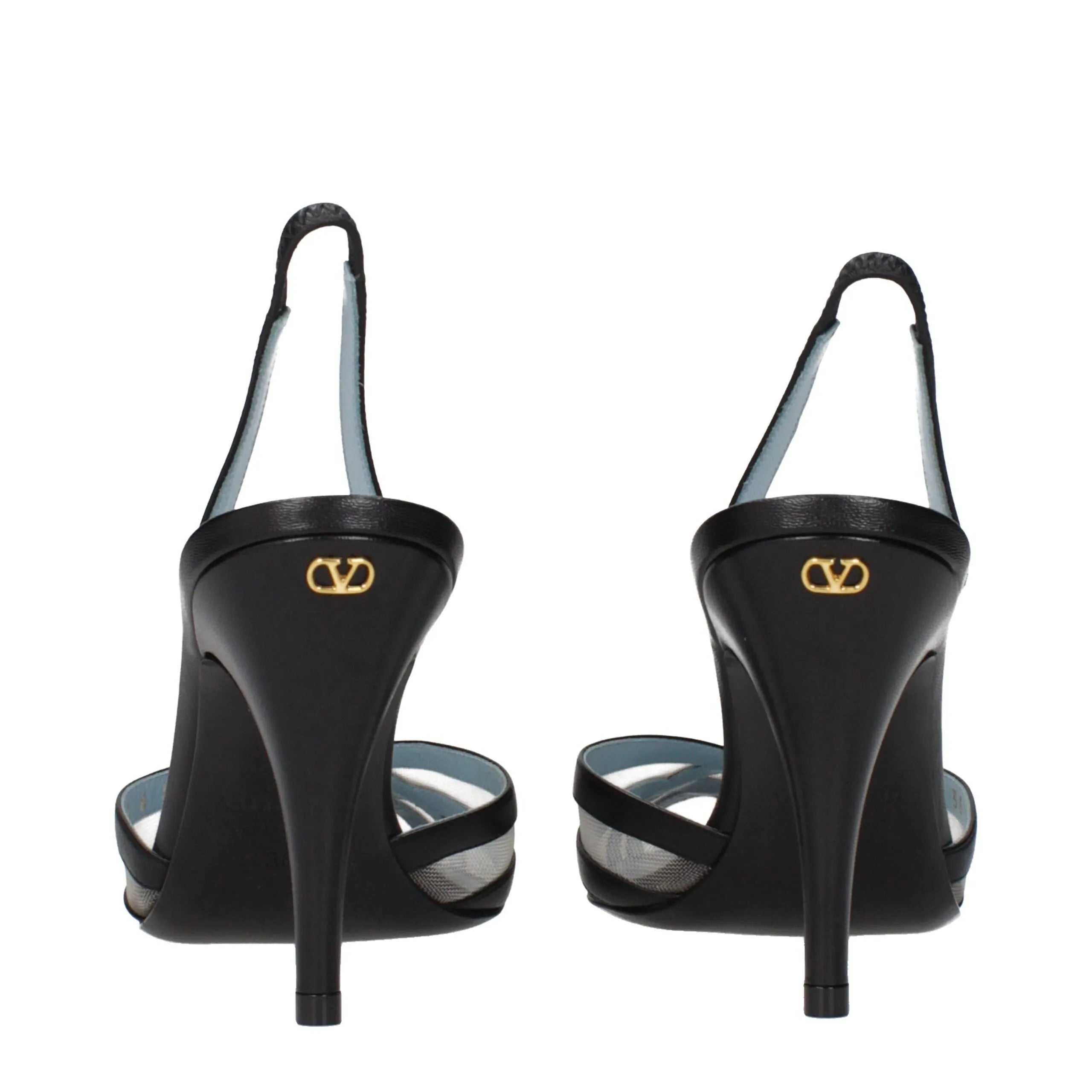 Black leather high-heel slingback sandals with gold Valentino V-logo on the heel.