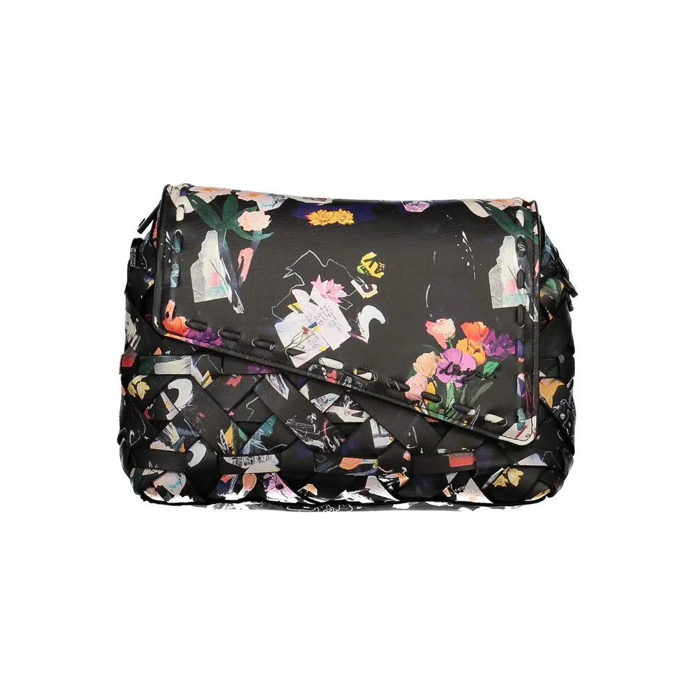 Desigual black polyurethane mini handbag with a vibrant floral print flap and woven abstract pattern body.