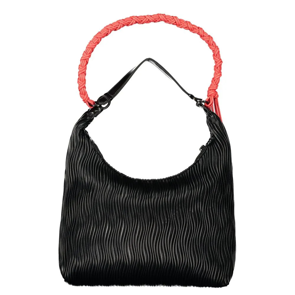 Black wavy polyurethane mini bag with a thin shoulder strap and a vibrant coral braided top handle.
