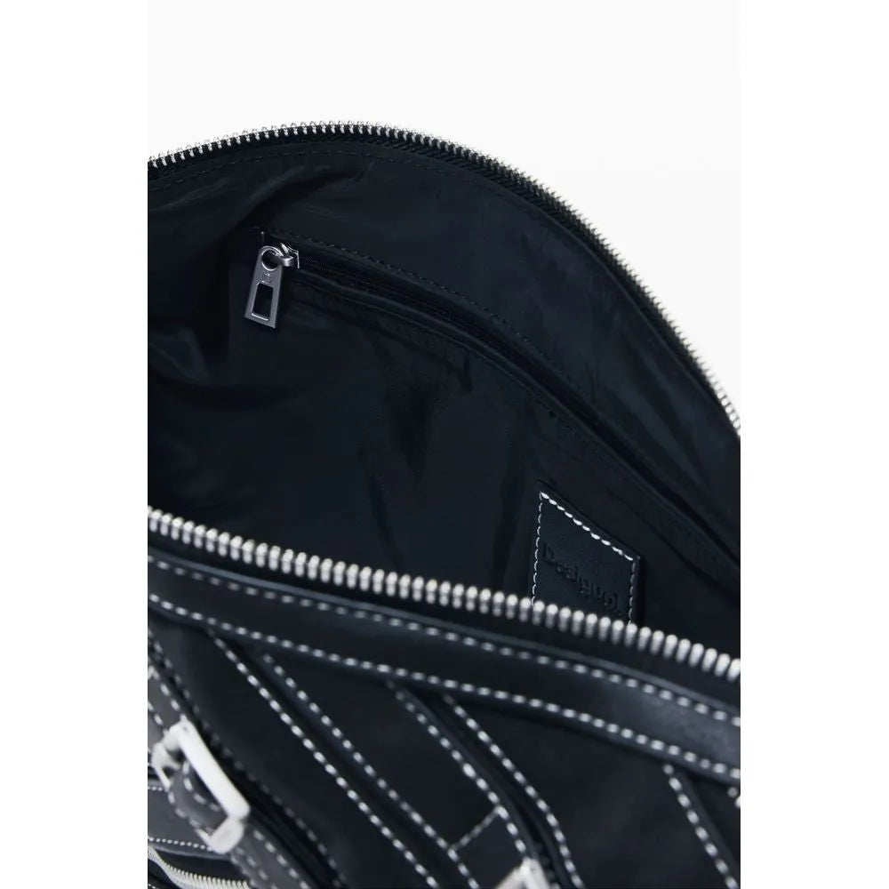 Nero Desigual poliuretano shoulder bag, open, with white contrast stitching and interior zip pocket.