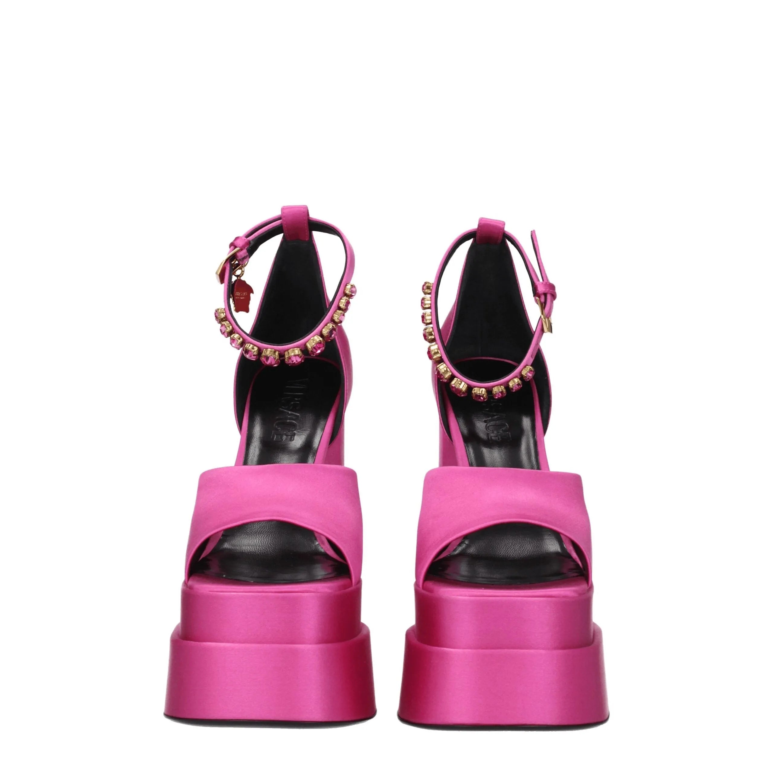 Fuchsia satin Versace platform sandals with open toe, rhinestone ankle strap, and high block heel.