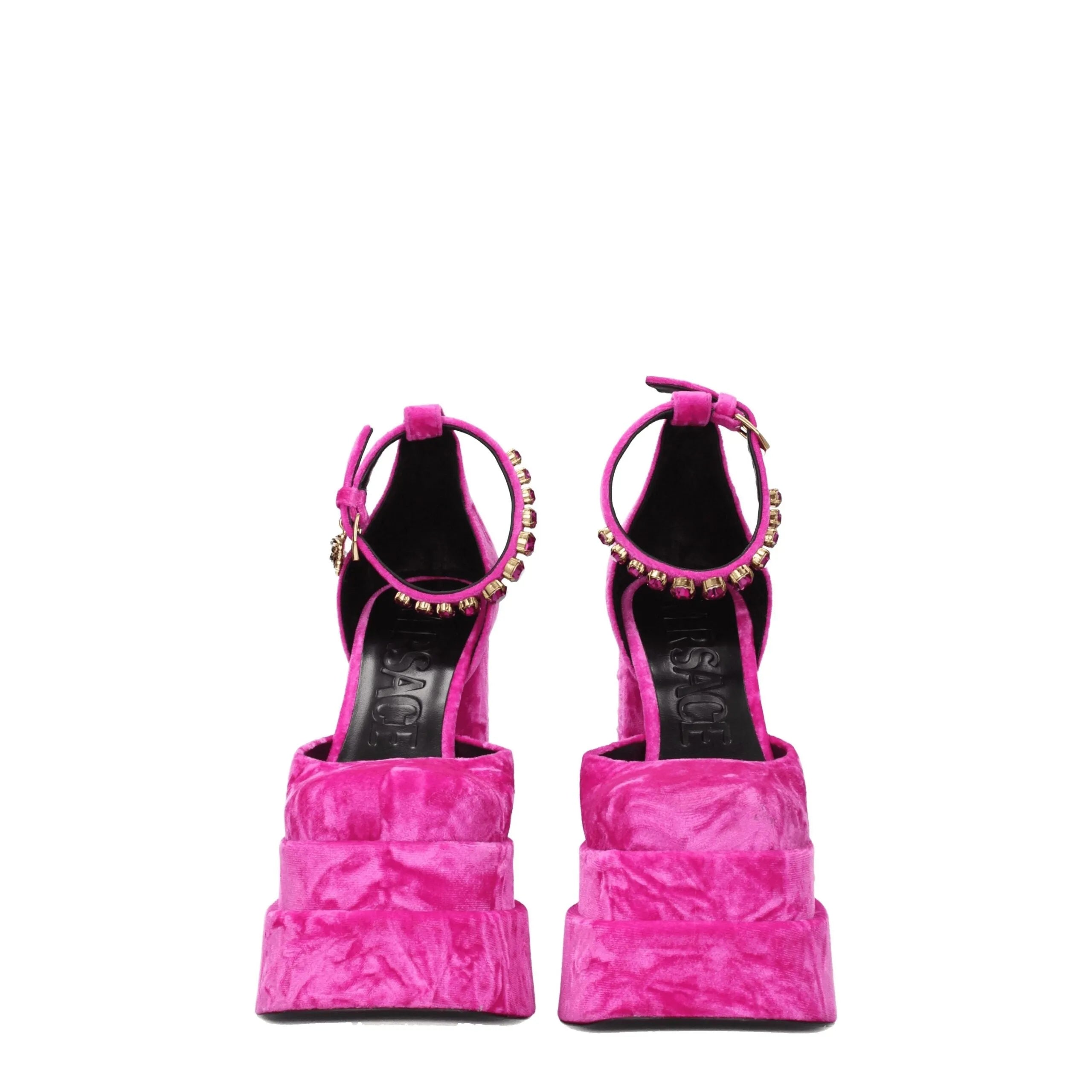 Versace fuchsia velvet platform sandals with gold rhinestone ankle straps and high block heels.