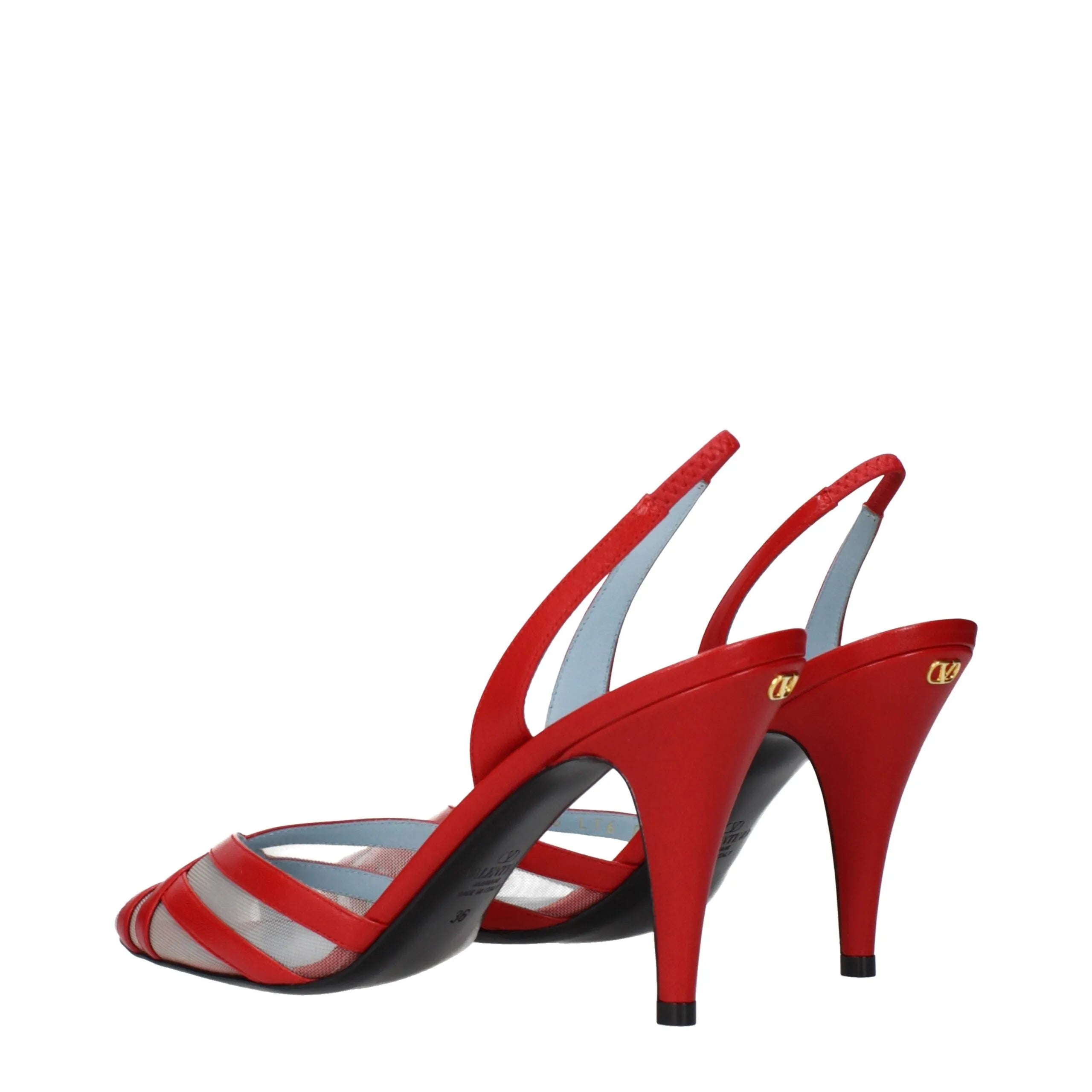 Red leather Valentino Garavani slingback stiletto sandals with sheer striped toe and gold V logo.