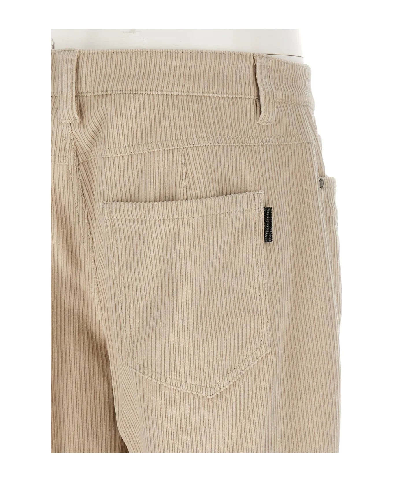 Brunello Cucinelli women's milk cotton ribbed pants, with back pocket and black brand tag.
