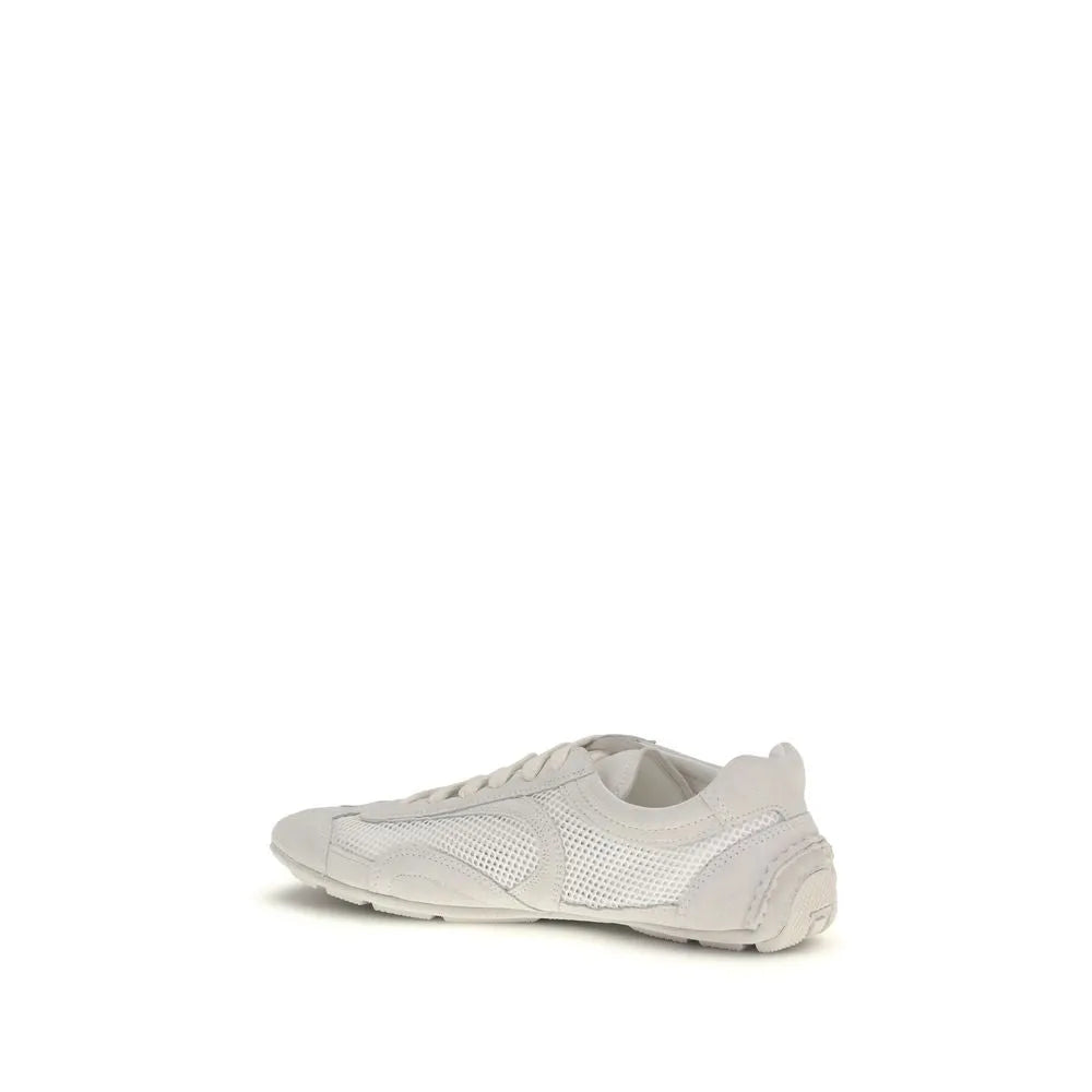 White low-top sneakers with breathable mesh and soft suede panels, featuring a lace-up front.