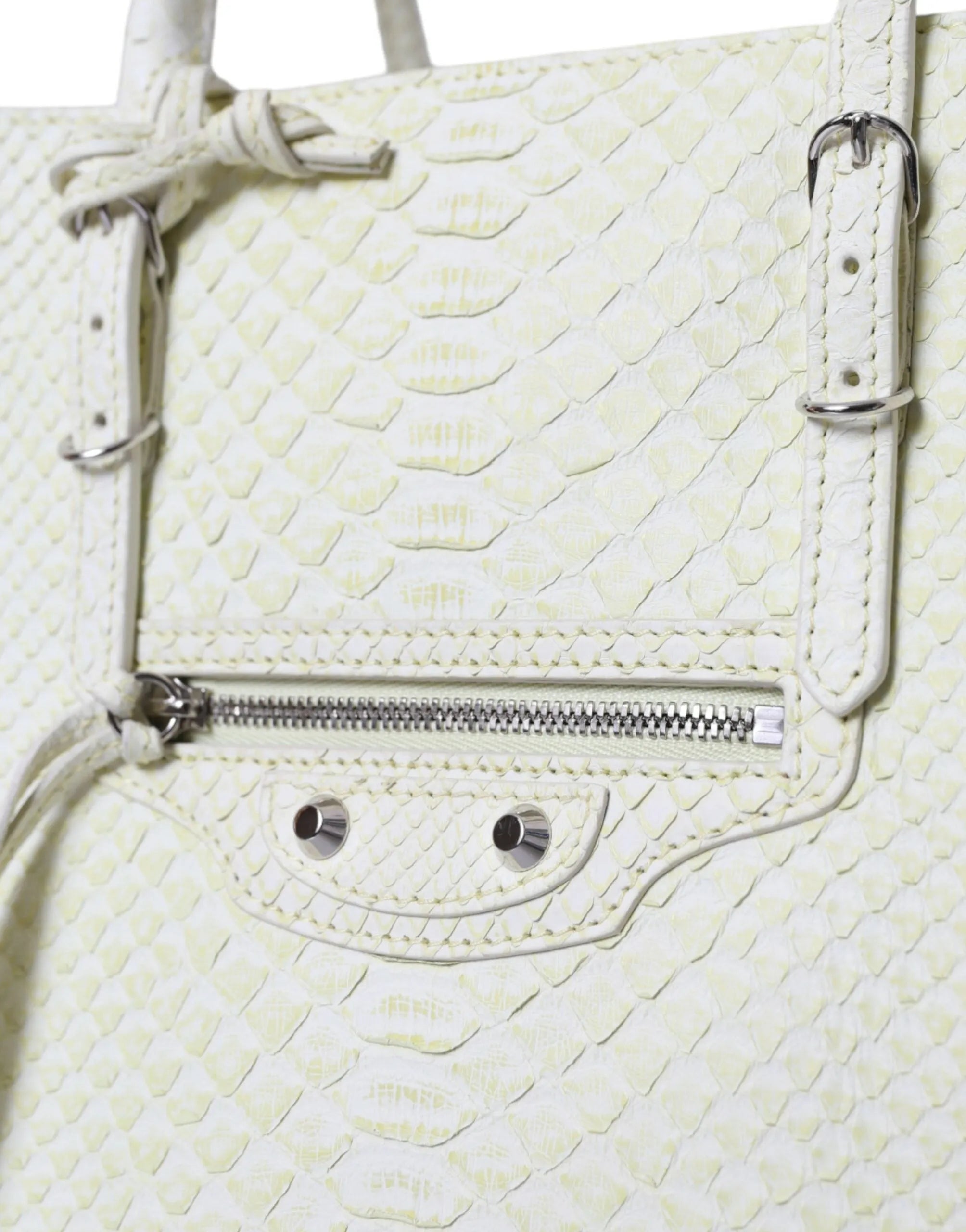 White & lemon yellow python Balenciaga Papier tote bag with silver studs, buckle, and front zip pocket.