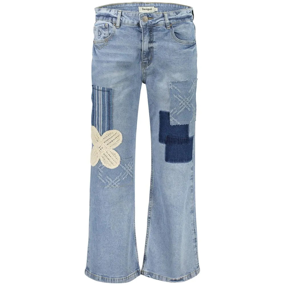 Desigual Azzurro cotton women's jeans with blue patchwork, a cream crocheted flower, and flared legs.