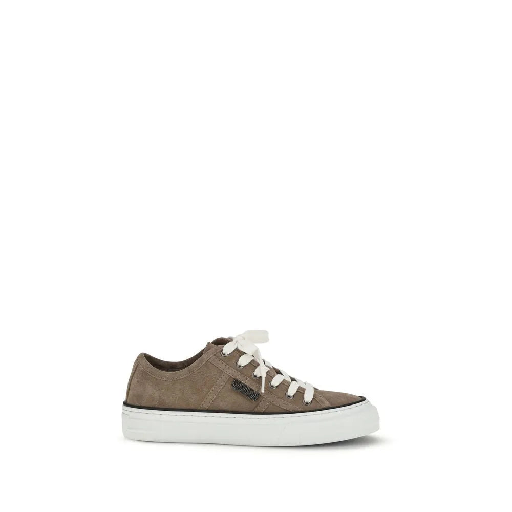 Beige calf leather suede low-top sneaker with white laces, thick white rubber sole, and a shiny brand tab.