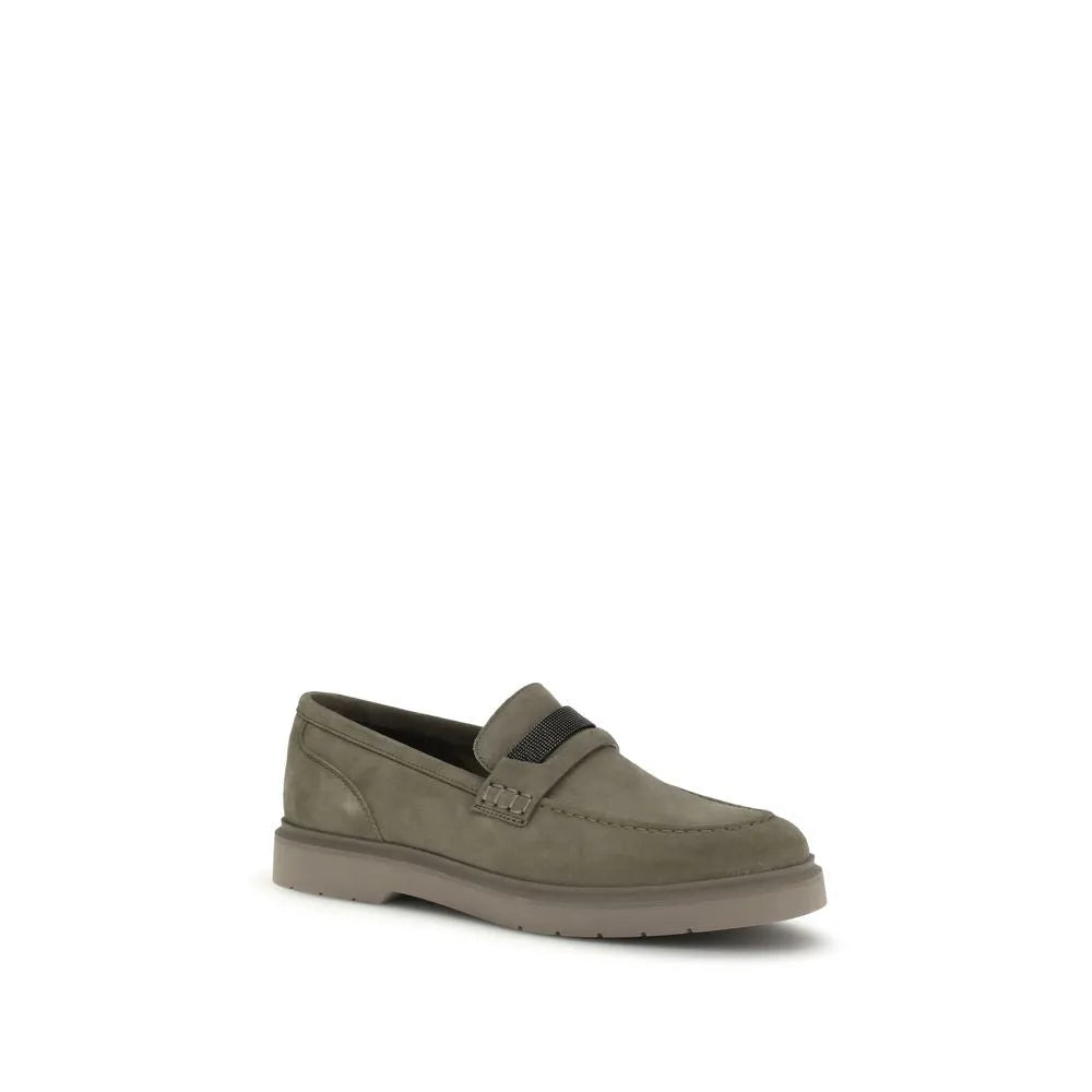 Muted grey-green suede slip-on loafer with almond toe, jeweled strap, and thick rubber sole.