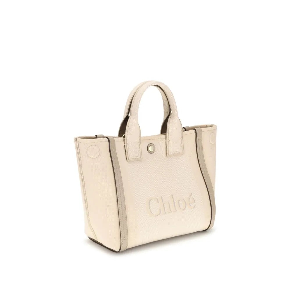 Chloé beige cotton tote bag with contrasting side panels, double top handles, and embossed logo.