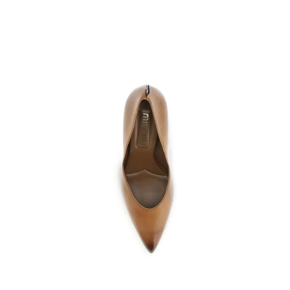 Miu Miu beige vintage-effect leather high heel pump with pointed toe and branded heel.
