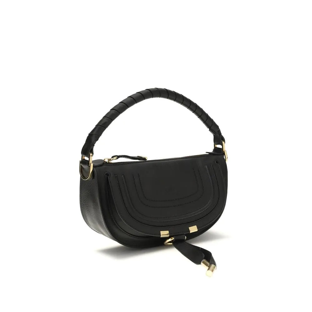 Black Chloé Marcie mini smooth calf leather shoulder bag with a wrapped top handle, gold hardware, and tassels.
