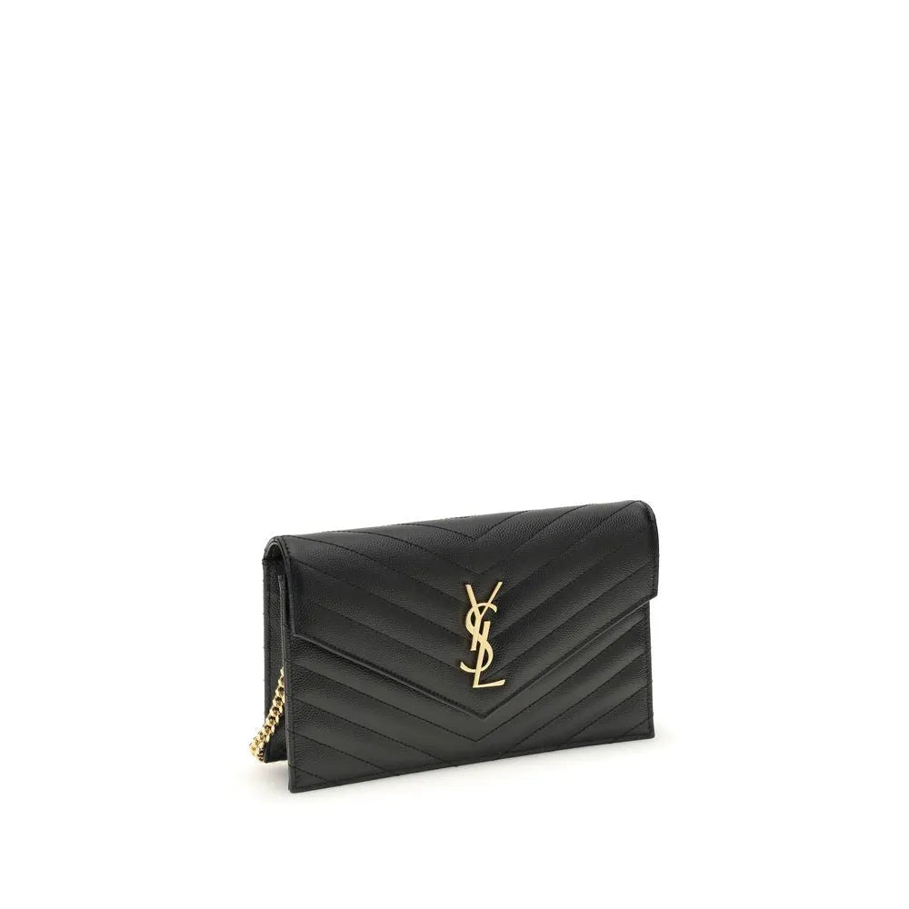 Black calf leather Saint Laurent Cassandre mini shoulder bag, gold YSL logo, chevron quilting, and chain strap.