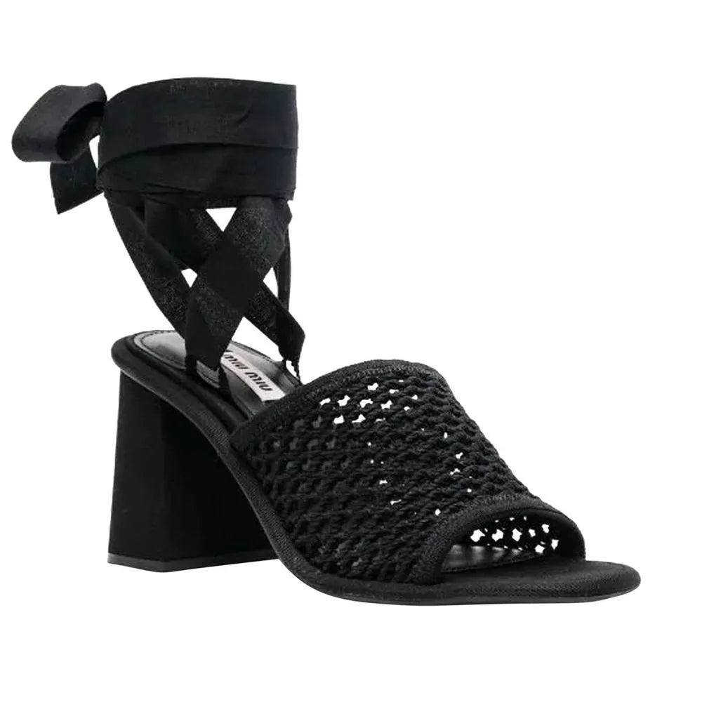 Black Miu Miu fabric platform sandals with crochet front, 8cm block heel, and ankle wrap bow.