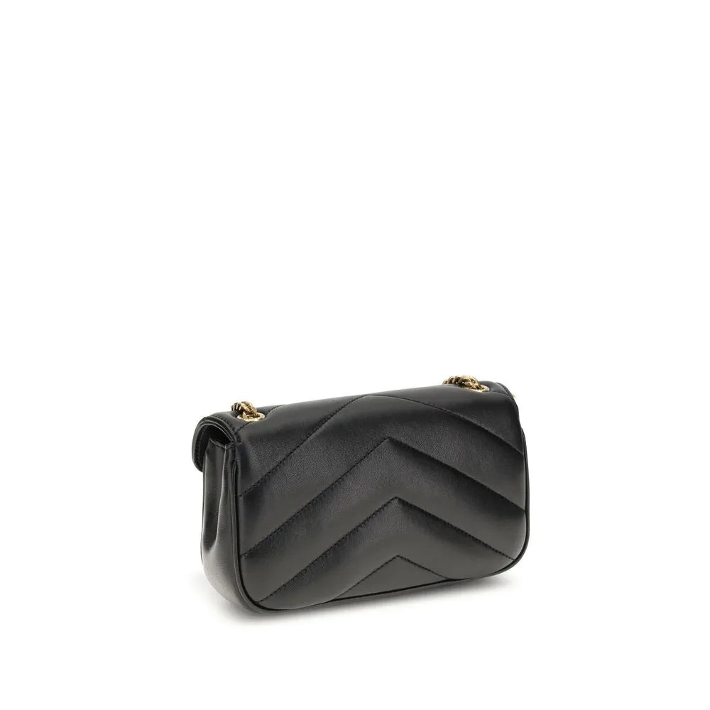 Saint Laurent Lou Lou black lambskin shoulder bag with chevron quilting and gold chain.