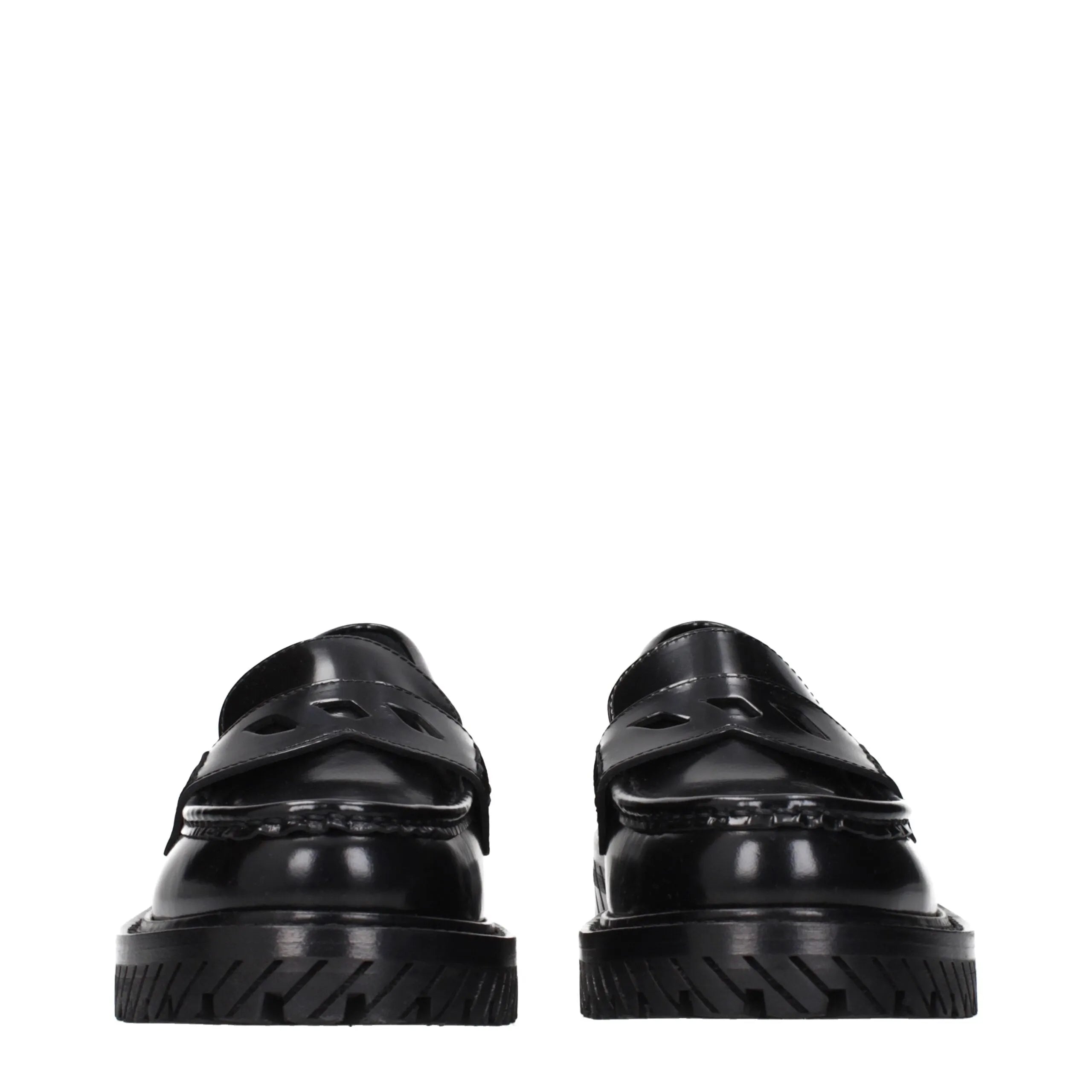 Glossy black leather Off-White slip-on loafers with chunky treaded soles and cutout penny straps.