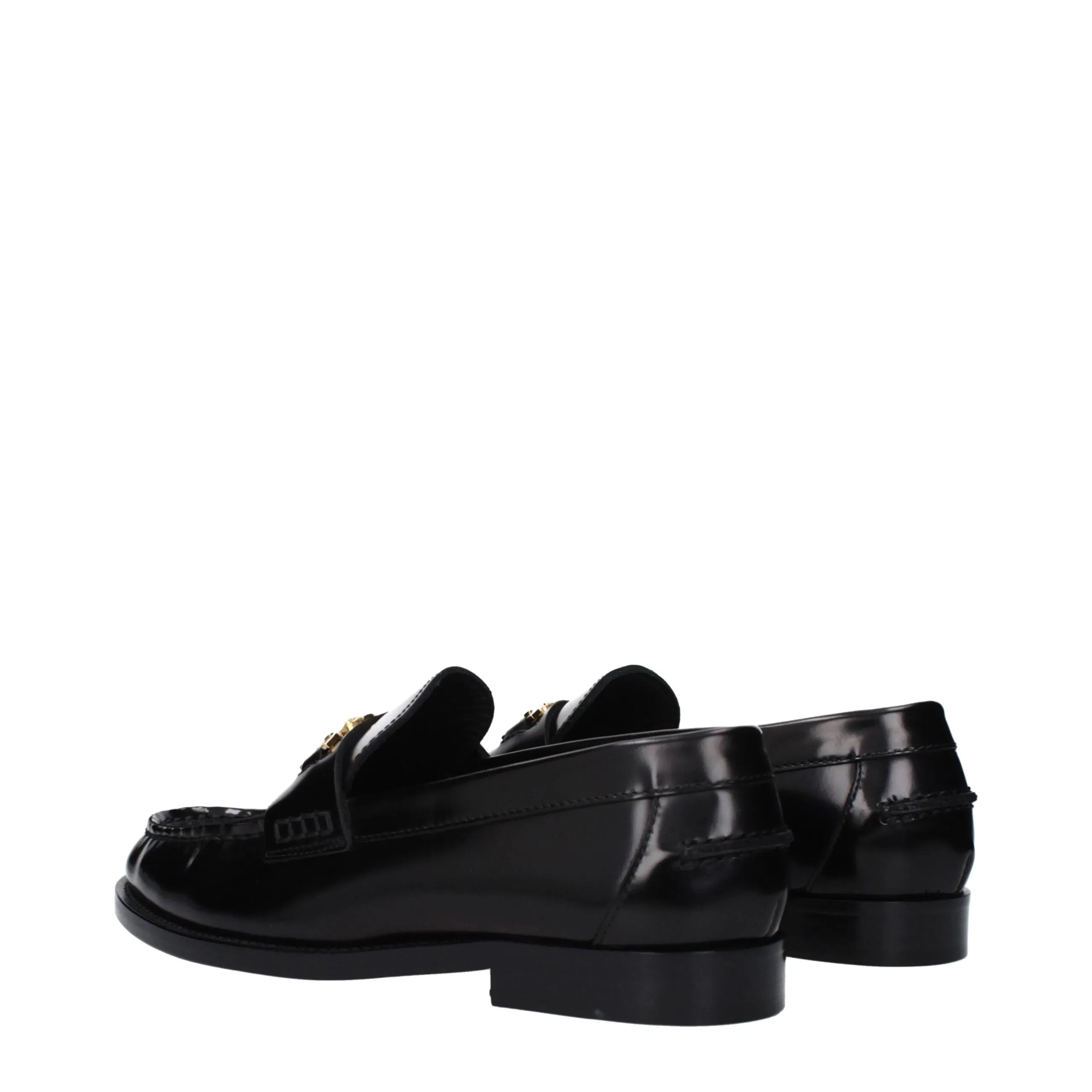 Shiny black leather Versace slip-on loafers with gold-tone front logo, round toe, low heel.