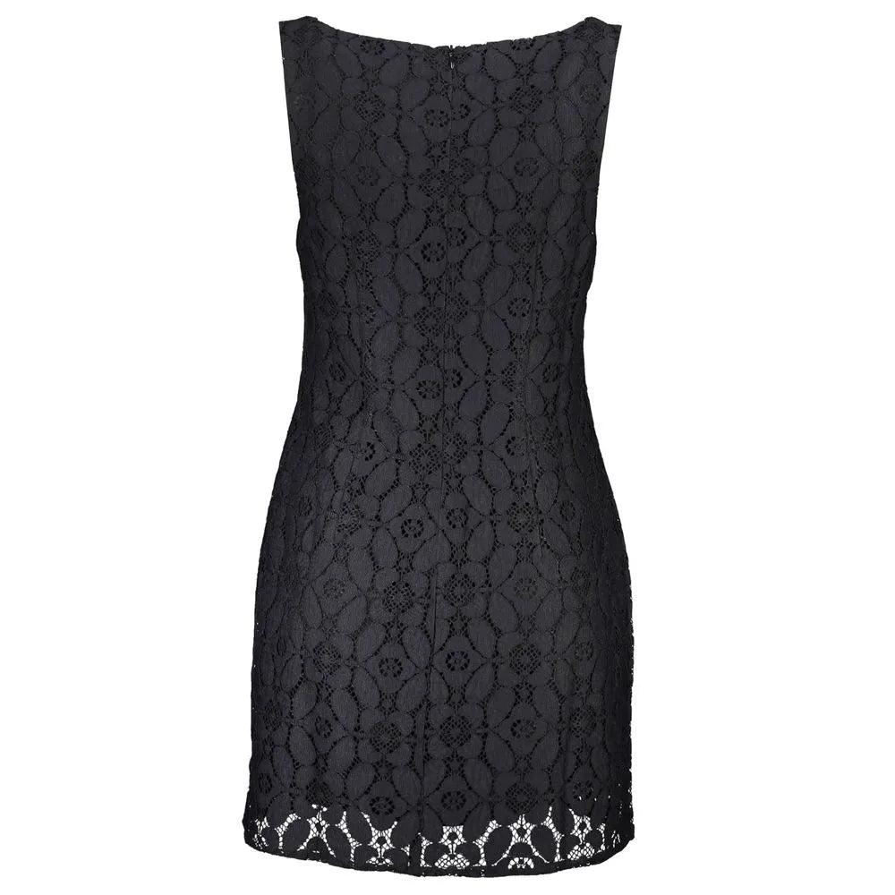 Black polyester sleeveless dress, back view, featuring a textured floral pattern and a discreet back zipper.