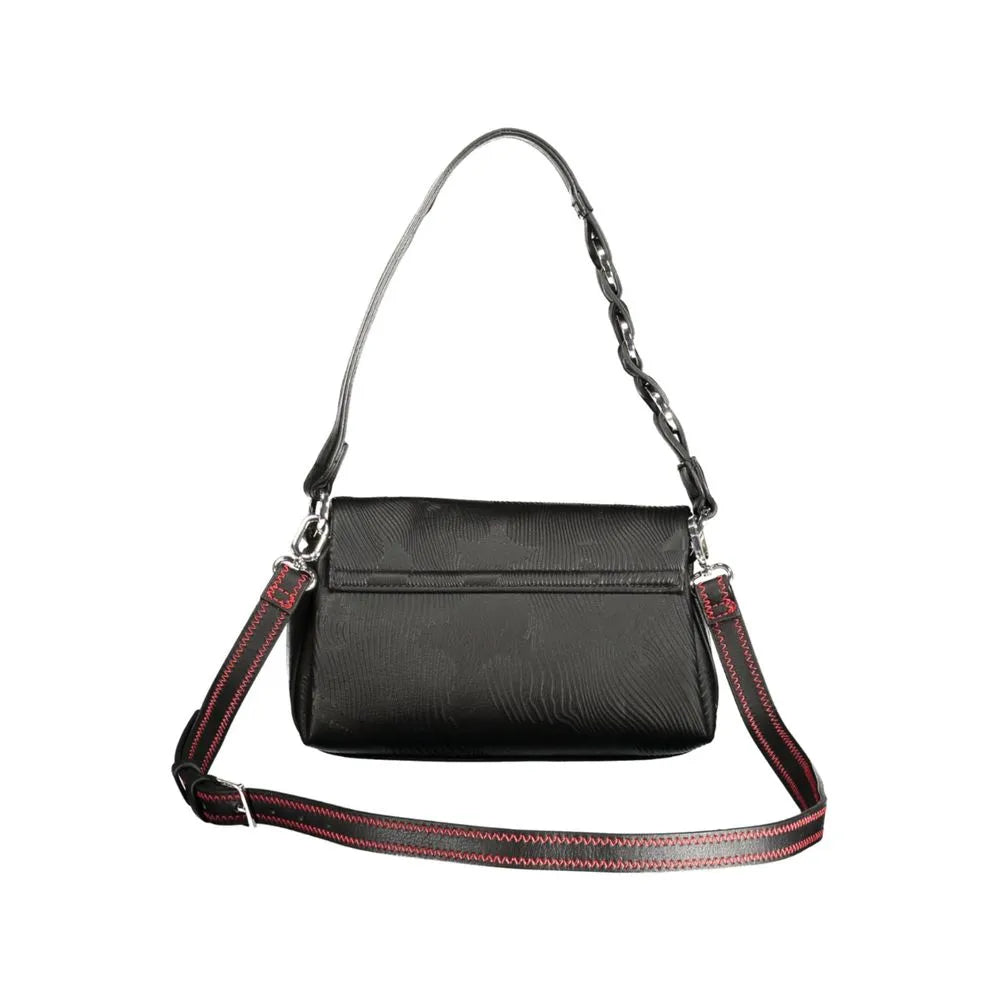 Desigual black polyurethane mini flap bag with textured finish, removable shoulder handle, and adjustable strap with red stitching.