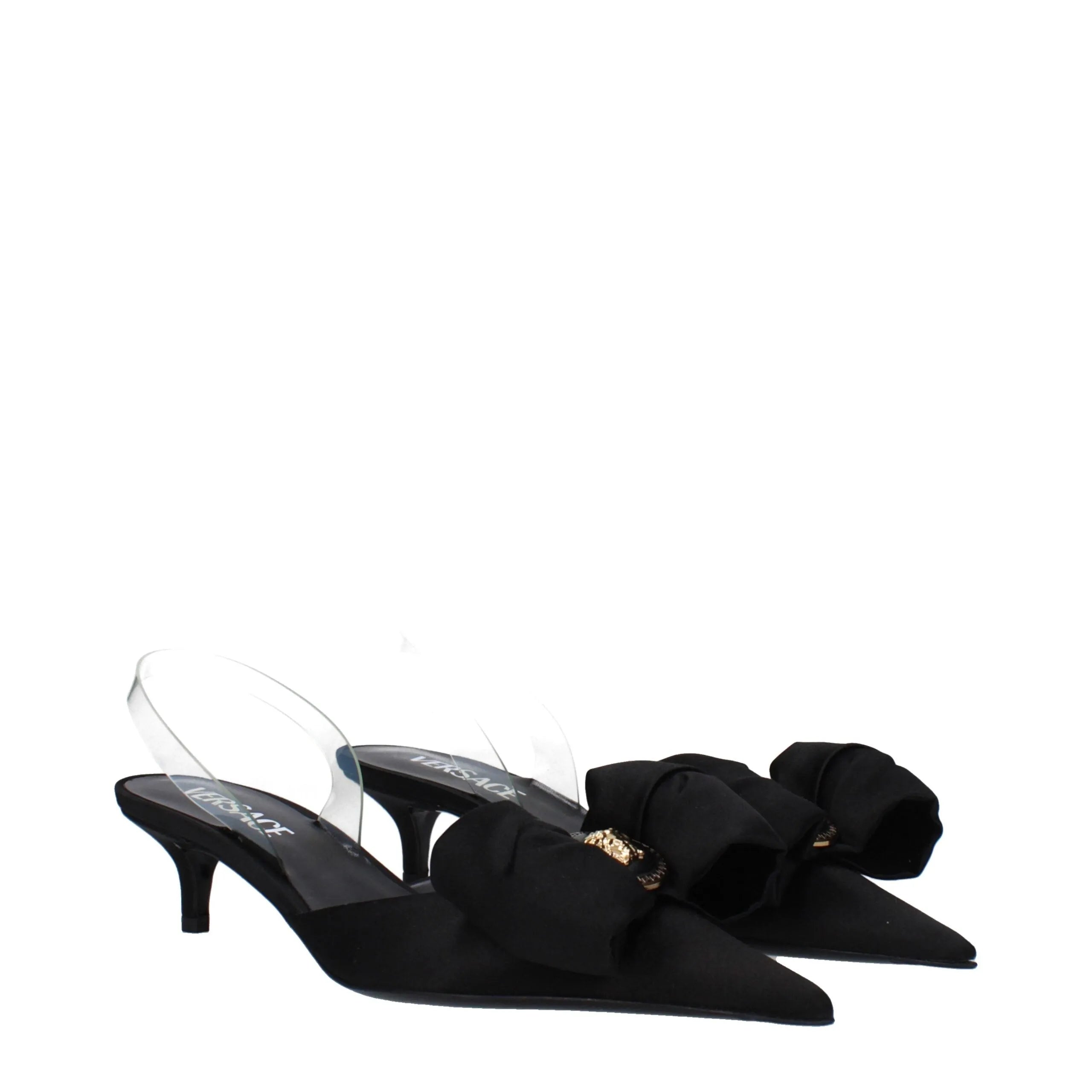 Versace black satin pointy-toe mid-heel slingbacks with transparent straps and a decorative front bow.