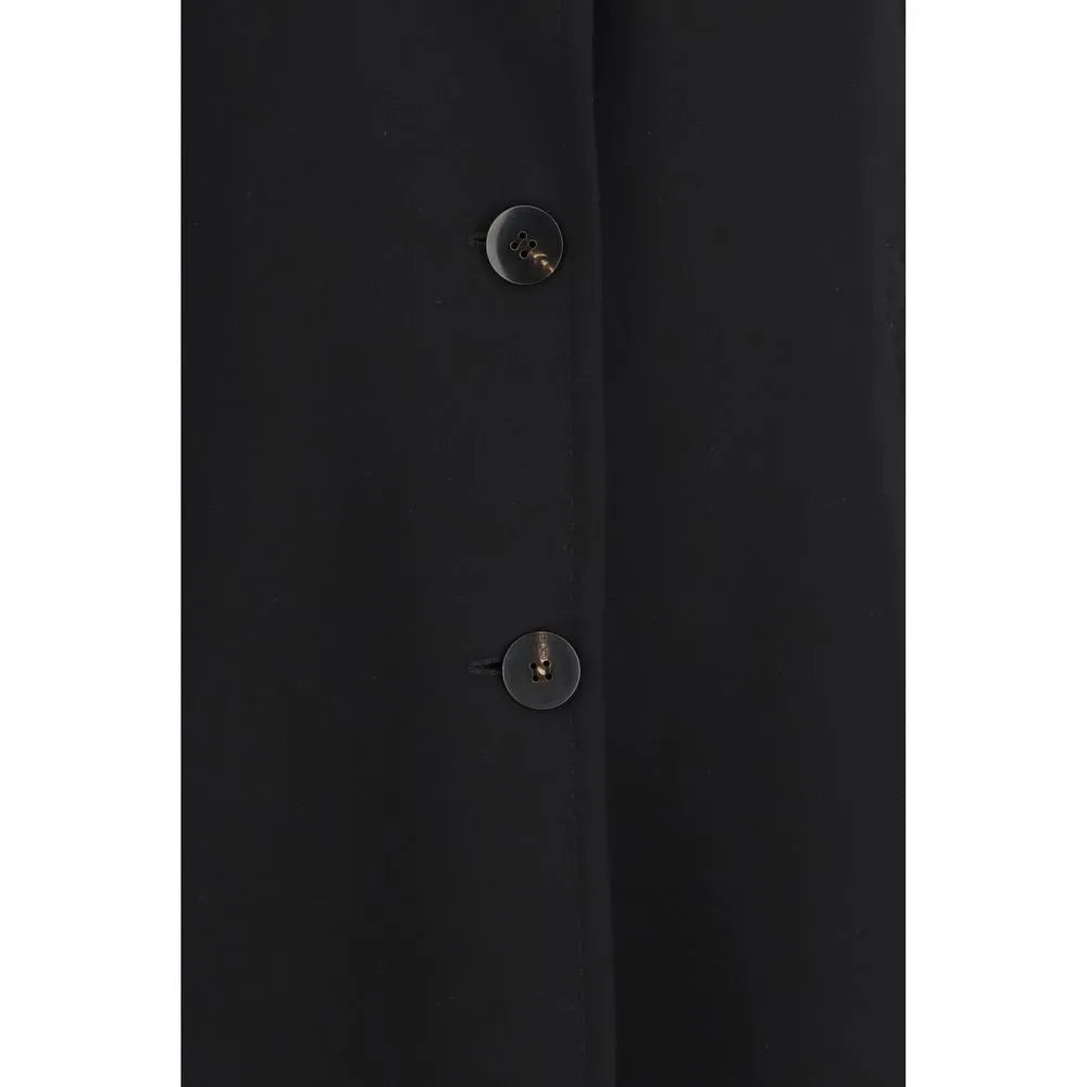 Black Max Mara Studio triacetate coat, close-up of front button fastening. Smooth fabric, two dark brown buttons.