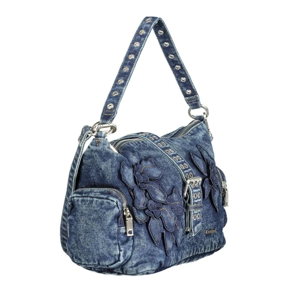 Blue cotton denim Desigual women's shoulder bag with studded strap, floral appliques, and front pockets.