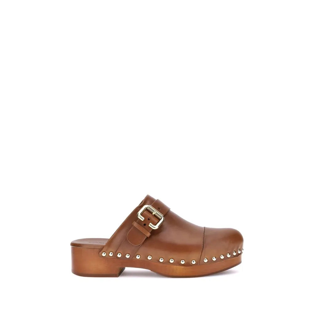Brown calf leather clog mule with wooden platform, round toe, golden buckle, and silver studs.