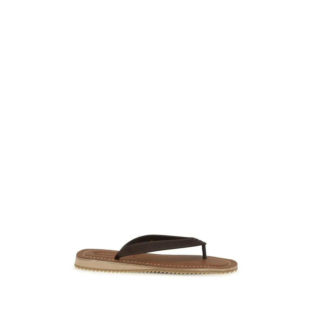 Brown calf leather flip-flop sandal with dark straps, visible white stitching, and a ridged tan rubber sole.
