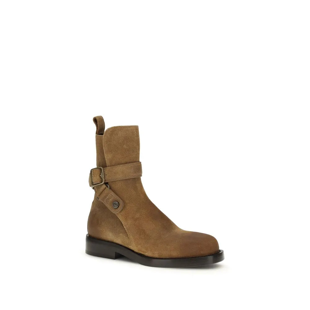 Tan calf leather suede ankle boot with adjustable strap, metal buckle, and rounded toe.