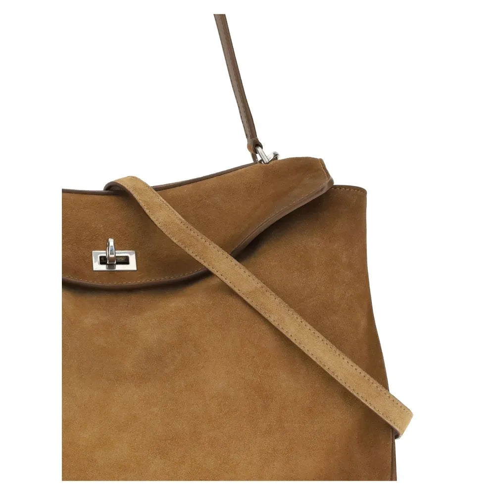 Balenciaga brown waxed suede shoulder bag with antique silver turn-lock closure and top handle.