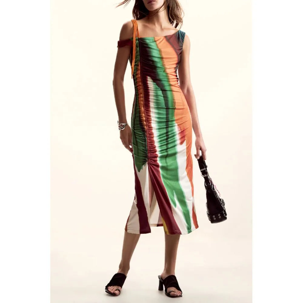 Vibrant DESIGUAL polyester midi dress with orange, green, brown abstract pattern, thin straps, ruched side, and a side split.