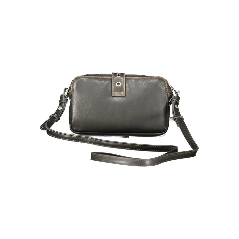 Marrone polyurethane women's crossbody bag with adjustable strap, front flap, silver eyelets, and light brown contrast stitching.