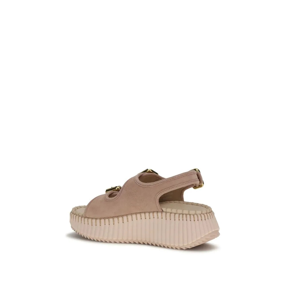 Pale pink calf leather Chloé Nama platform sandal with gold buckles and ribbed wedge sole.