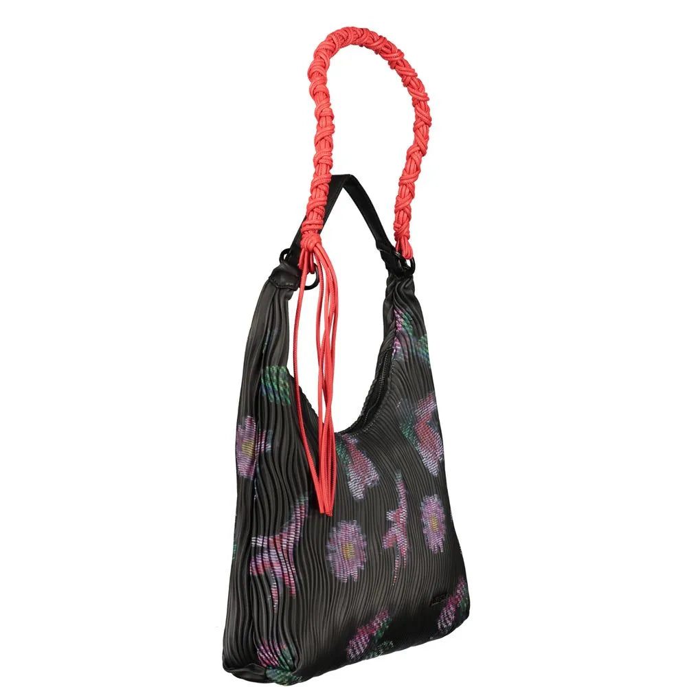 Desigual Nero polyurethane handbag with ribbed texture, vibrant floral pattern, and coral braided handle.