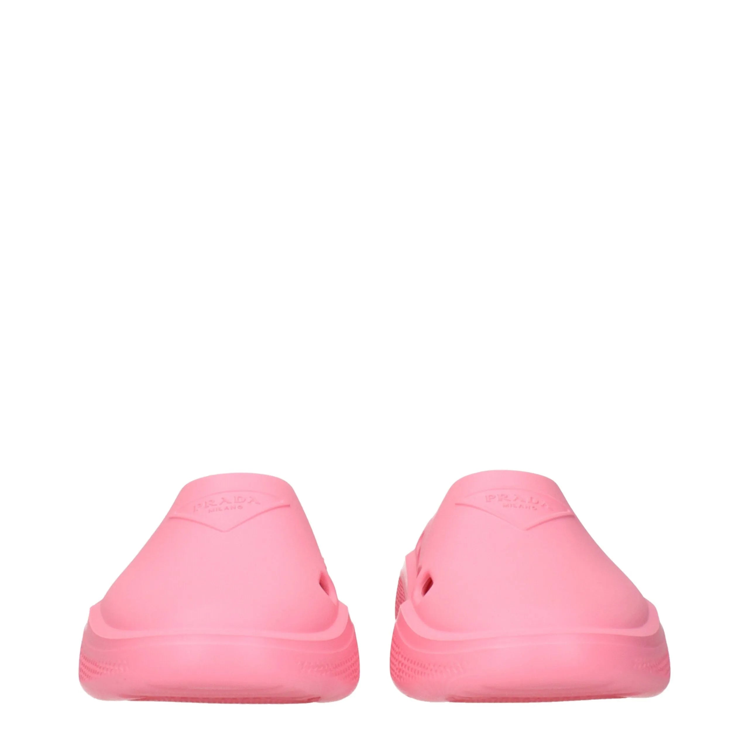Prada Begonia pink rubber clogs with embossed front logo, round toe, and low flat sole.