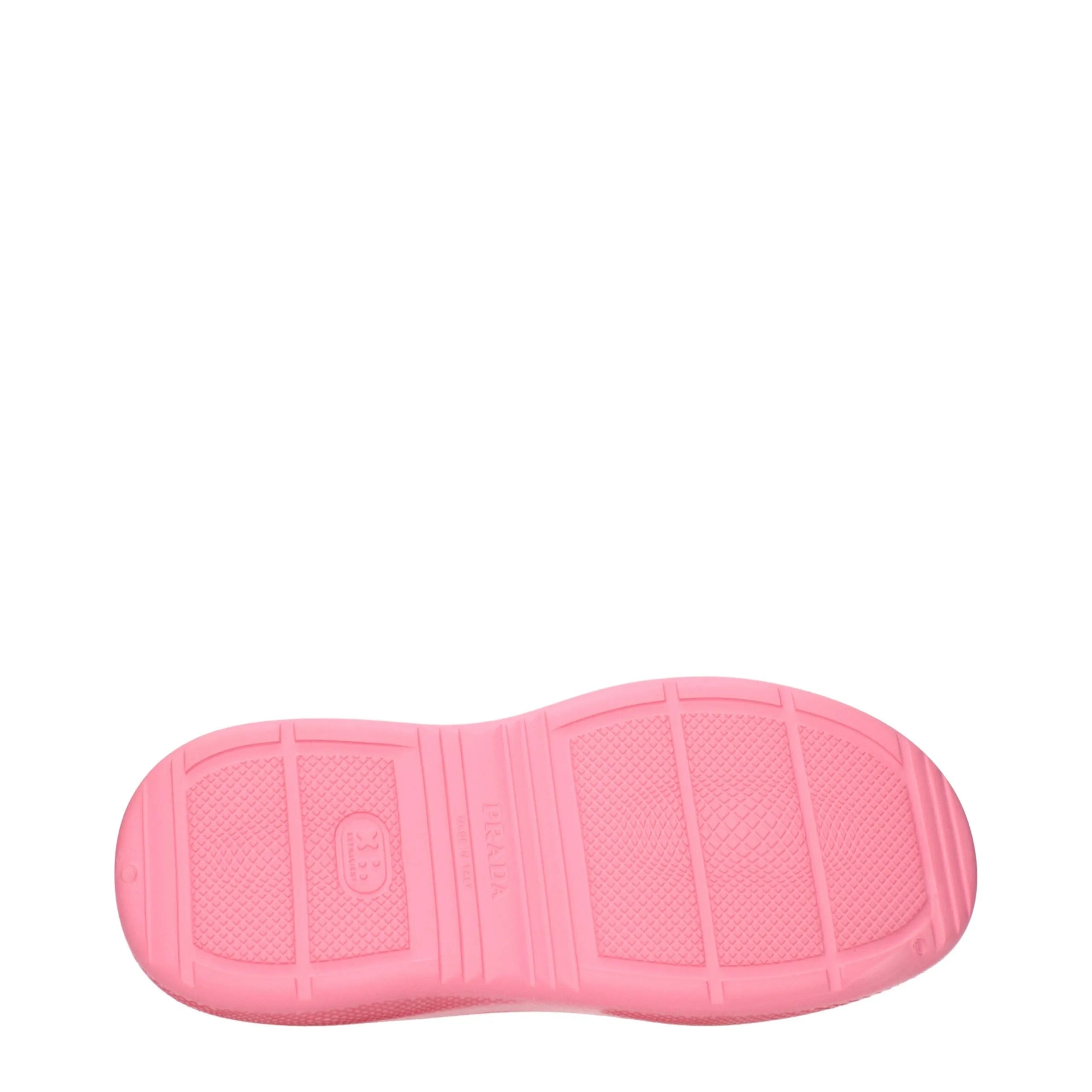 Pink rubber Prada slipper sole with textured grip, embossed logo, and "Made in Italy" detail.