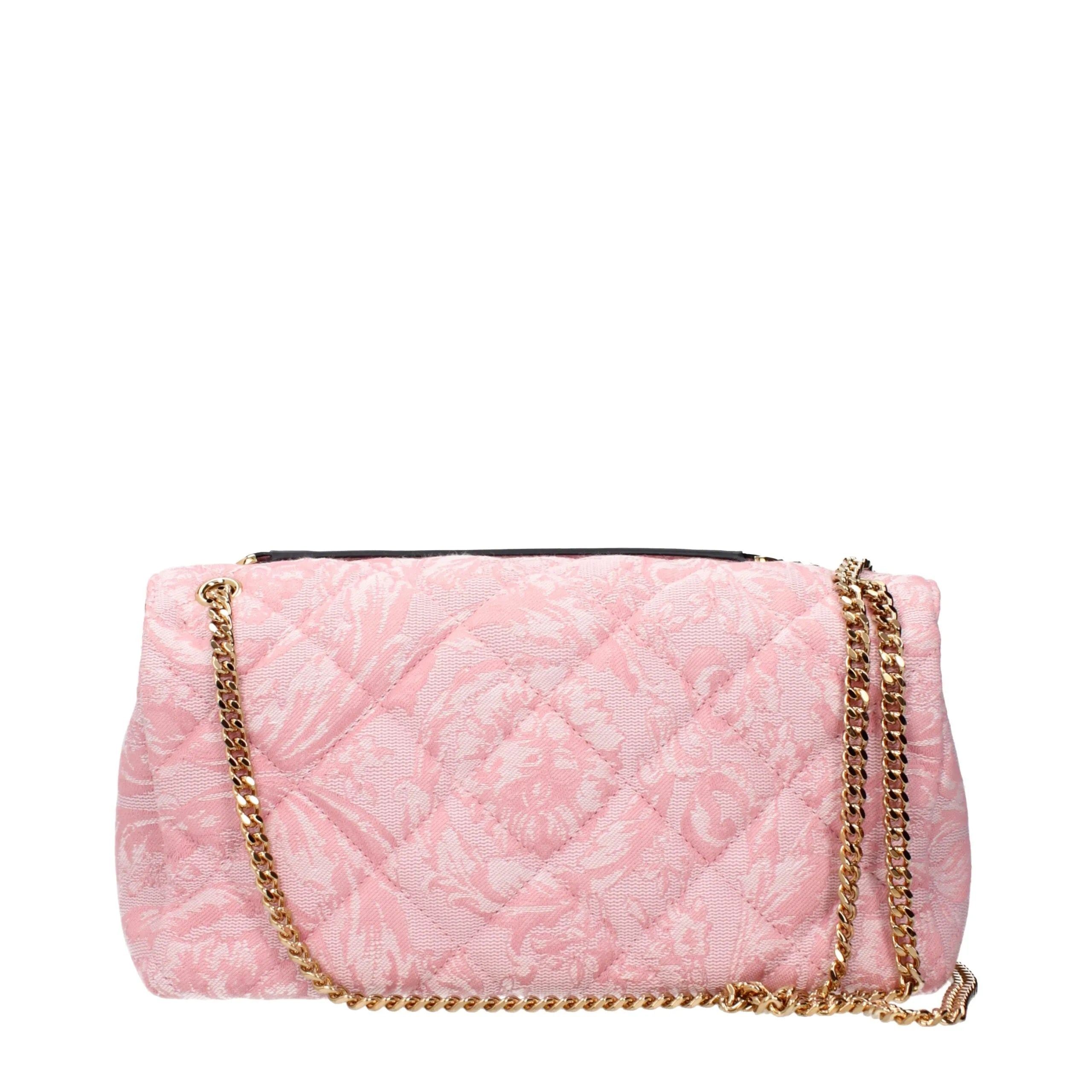 Versace pink quilted fabric shoulder bag with a woven floral design and gold chain strap.