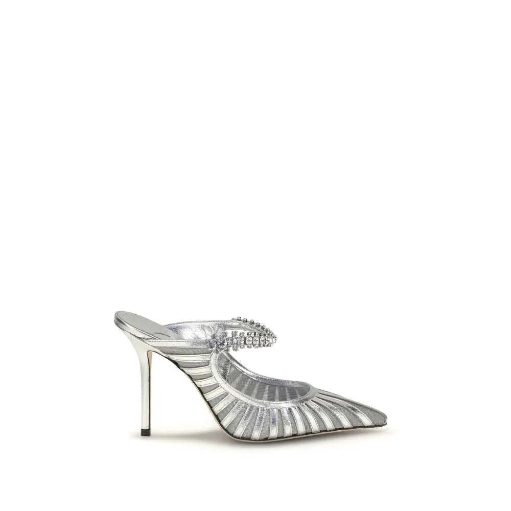 Silver metallic weave high heel mule with pointed toe, stiletto, and sparkling crystal strap.