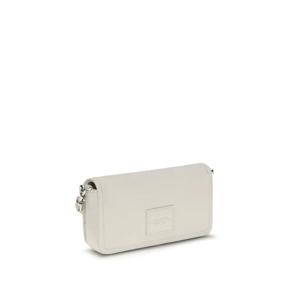 White grained calf leather shoulder bag with a front flap closure and debossed monogram.
