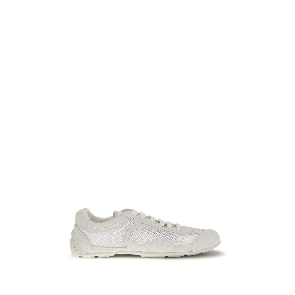 White low-top sneaker featuring mesh panels and suede overlays with white laces.