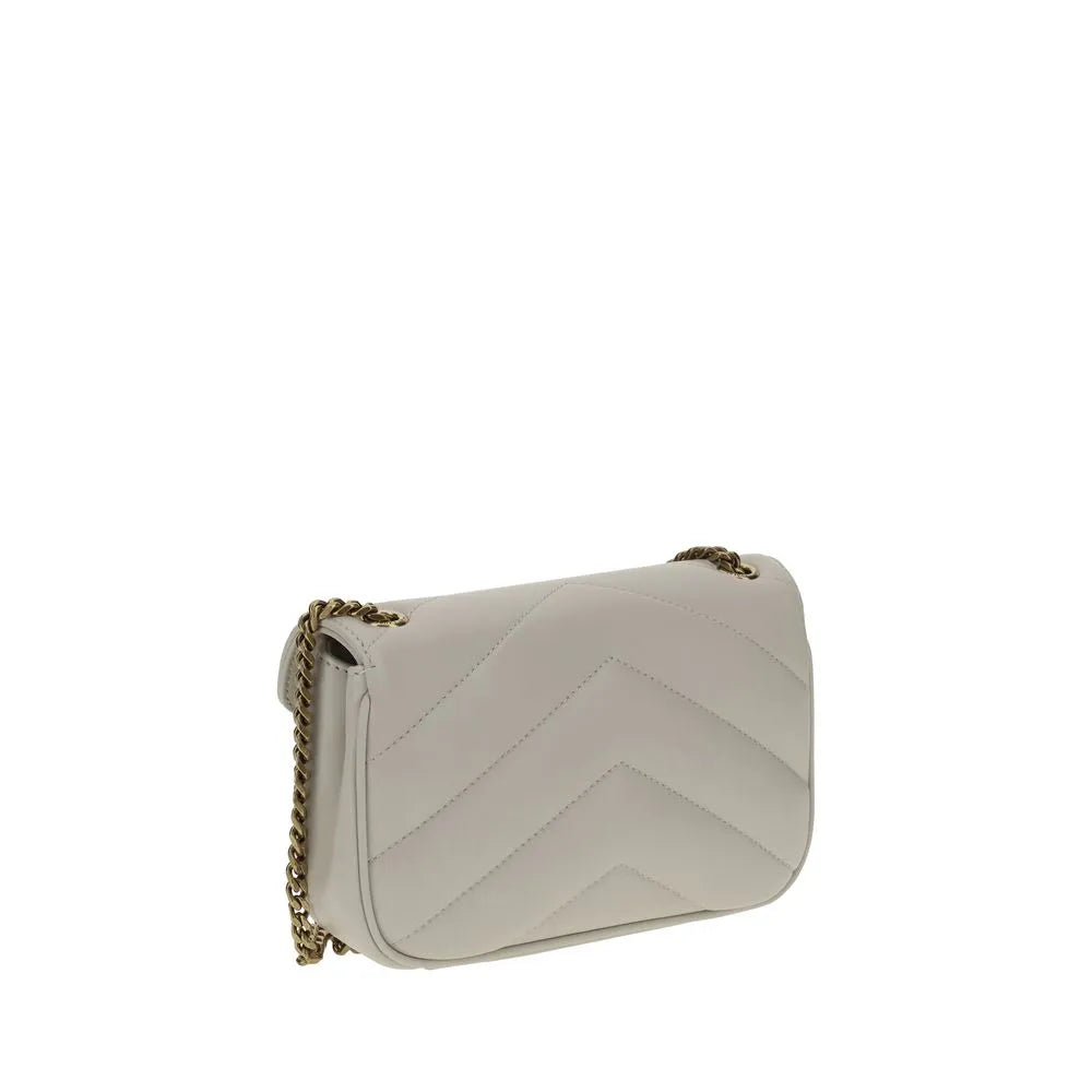 Elegant light grey lambskin shoulder bag featuring chevron quilting and a gold-tone chain strap.